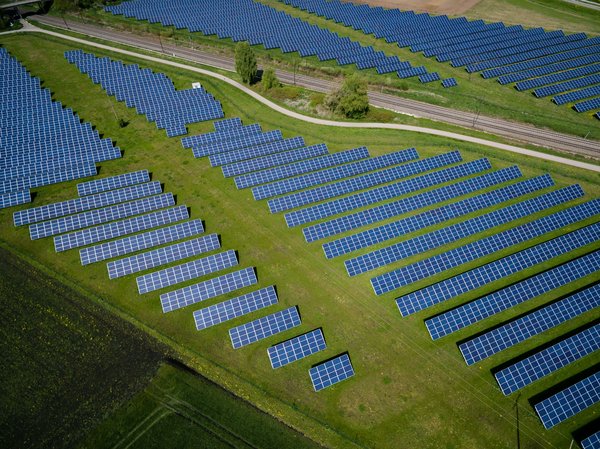 How to navigate the financial and legal aspects of installing large-scale solar farms on UK properties?